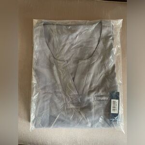 JAANUU women’s 1 pocket tuck in top